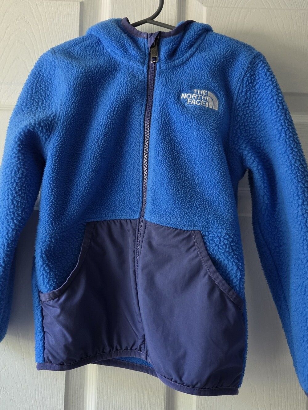 The North Face Kids Royal Blue Hooded Fleece Jacket with Navy Pocket Panels